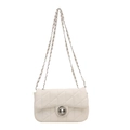 Elegant off-white quilted crossbody bag with silver twist lock and leather chain strap - White