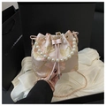 Detail of pink satin bucket bag featuring gold floral embroidery and pearl handle - Pink Large Flower