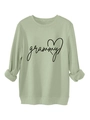Close-up of light green sweatshirt fabric showing soft texture and grammy heart print - S / Olive Green (Black Print)
