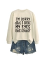 Detail of oversized cream sweatshirt with slogan print and distressed denim shorts set - Sand (Black Font)