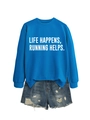 Detail of blue cotton sweatshirt with white lettering LIFE HAPPENS RUNNING HELPS - Lake Blue (White Font)