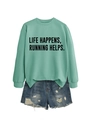 Detailed flat lay of mint green sweatshirt with Life Happens Running Helps slogan - Light Green (Black Font)