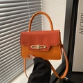 Bright orange crossbody bag with woven texture, metal lock, and top handle for women - Woven Texture Style / Orange