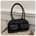 Detail of black crocodile embossed shoulder bag with dual front pockets on soft fabric - Black