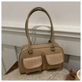 Detail of warm beige shoulder bag with crocodile pattern and dual front pockets - Khaki