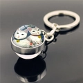 Silver glass ball keychain featuring a cute illustration of two white cats with bells - Two Cats with Bells Illustration(XSWX2233-8)