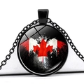 Black round Canada flag necklace with artistic maple leaf design and glass pendant - Artistic Splatter Style (JY008658-5)