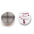 30mm round glass fridge magnet with Merci Maitresse print and black magnetic back - French Thank You Teacher Penguin Style (BXT2526-15)