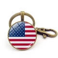Porte-clés vintage drapeau USA avec cadre en bronze et dôme en verre et mousqueton - Drapeau Américain à Surface en Verre Bronze Antique