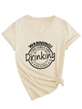 Detail of V-neck cotton T-shirt with warning print and stylish knotted hem design - S / Sand (Black Font)