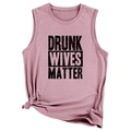 Detail of a dusty rose sleeveless tank top with DRUNK WIVES MATTER slogan and side knot - Rose Gold (Black Font)