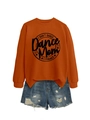 Detail of orange sweatshirt with I DON'T DANCE text print and side slit hem design - Burnt Orange (Black Font)