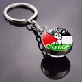 Palestine flag keychain with double-sided glass ball and Free Palestine fist design - Free Palestine Fist Style (JY008766-1)