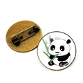 Runde Panda-Brosche mit Bambus-Motiv und einer Anstecknadel aus Vintage-Bronze - Antike Bronze - Panda hält und frisst Bambus