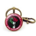 Antique bronze Palestine flag keychain with raised fist design and Free Palestine text - Fist Free Palestine & End Apartheid Style (Copper 3)