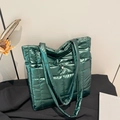 Quilted green padded shoulder bag with metallic finish and large capacity for commuting - Green