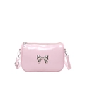 Pink patent leather crossbody bag with a silver metal bow accent on a clean white background - Pink