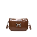 Chic brown glossy leather crossbody bag with a silver metal bow accent for women - Brown