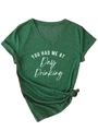 Detail of heather dark green V-neck T-shirt with 'YOU HAD ME AT Day Drinking' white print - Vintage Green