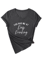 Detail of dark gray V-neck T-shirt with white YOU HAD ME AT Day Drinking print - Black Heather Grey