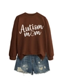 Detail of Autism Mom brown sweatshirt featuring a puzzle piece graphic and ripped denim shorts - Coffee (White Font)
