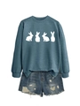 Detail of grey-blue crewneck sweatshirt with white rabbit silhouettes and ripped denim shorts - Blue (White Rabbit)