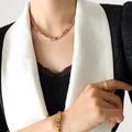 Elegant gold jewelry set featuring colorful square-cut zircons worn with rings on model - 39cm / Multicolor Necklace