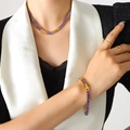 Golden jewelry set with purple zircon necklace, bracelet, and geometric rings on model - 39cm / Purple Necklace