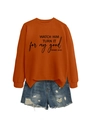 Detail of orange crewneck sweatshirt with black Genesis 50:20 typography design - Burnt Orange (Black Font)