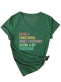 Macro detail of V-neckline and textured dark green fabric with printed typography - S / Vintage Green