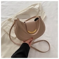 Detail of dusty rose crescent leather shoulder bag with gold half-moon metal hardware - Dusty Rose Pink / Khaki