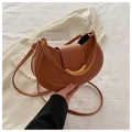 Detailed view of a brown leather crescent shoulder bag with golden crescent metal buckle - Brown Leather Metal Buckle / Tan