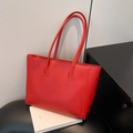 Classic red matte leather tote bag with long handles and minimalist stitching detail - Red