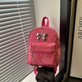 Pink pleated mini backpack featuring a metallic silver bow and stylish front zip pocket - Rose Pink