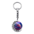 Close-up of a silver sea turtle spinning pendant keychain with vibrant coral reef artwork - Rose Red Orange Brilliant Turtle (JY009031-7)