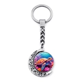 Silver rotating keychain with colorful sea turtle pendant and moon-shaped filigree frame - Coral Background Color Turtle (JY009031-6)
