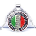 Macro shot of silver Leaning Tower of Pisa pendant with Italian flag and O-chain detail - Italy Style