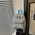 Chic silver mini backpack with ribbon charm and bright blue handle for women - Blue