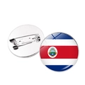 Detailed front and back view of Costa Rica flag round pin badge with safety pin fastener - Costa Rica