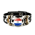 Detailed macro of vintage multi-layer leather bracelet with Paraguay flag emblem - Paraguay