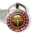 Detailed close-up of a roulette wheel glass cabochon pendant with metal keychain - Roulette Style 8 (JY009111-8)