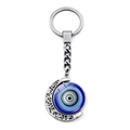 Macro view of rotating silver moon keychain featuring a blue evil eye glass nazar charm - Crescent Nesting Style (JY009120-10)
