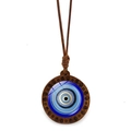 Close-up of Turkish evil eye pendant with carved wood frame and brown woven rope - Spiral Wood Evil Eye (JY009130-10)