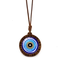 Ethnic blue evil eye wood necklace with spiral carving on a brown braided rope - Spiral Wood Evil Eye (JY009130-9)