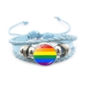 Bracciale intrecciato celeste con emblema arcobaleno e perline in metallo argentato - Blu-Bandiera Arcobaleno LGBTQ+ (Blu-1)
