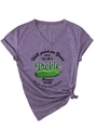 Detail of V-neck purple heather T-shirt featuring green pickle graphic and slogan - S / Black Printed / Purple
