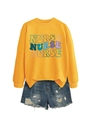 Macro view of bright yellow cotton sweatshirt fabric and colored nurse lettering print - S / Yellow
