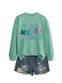 Detail of light green nurse crewneck sweatshirt with colorful wavy typography design - S / Light Green