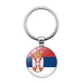 Round metal keychain featuring Serbia flag and coat of arms under glass cabochon - Serbia
