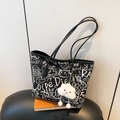 Graffiti canvas tote bag in black with white street art patterns and plush cloud charm - With Pendant / Black